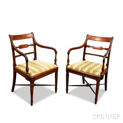 Pair of Neoclassical Carved Mahogany Armchairs