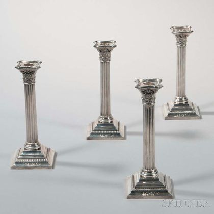 Four Sterling Silver Candlesticks