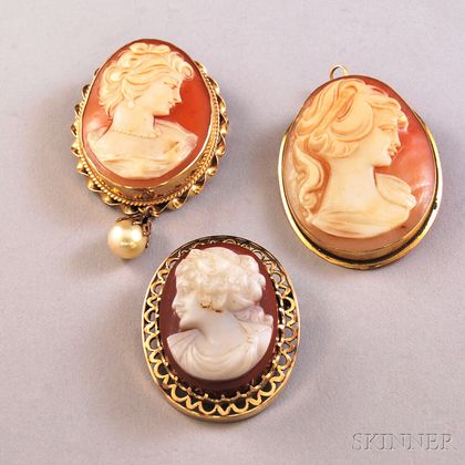 Three Gold-framed Cameo Pendant/Brooches