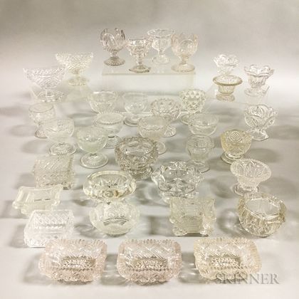 Thirty-five Colorless Pressed Glass Salts. Estimate $150-250