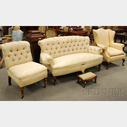 Late Victorian Upholstered Settee, a Slipper Chair, a Queen Anne Style Wing Chair, and an Empire Footstool. Estimate $300-500