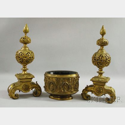 Pair of Baroque-style Reticulated Brass Andirons and an Oval Repousse Brass Footed Jardiniere