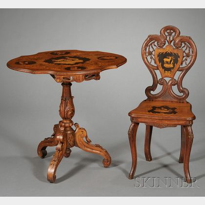 Two Pieces of Swiss Marquetry-inlaid and Carved Walnut "Black Forest" Furniture