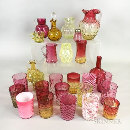 Twenty-seven Pieces of Mostly Cranberry and Amberina Glass Tableware. Estimate $200-300