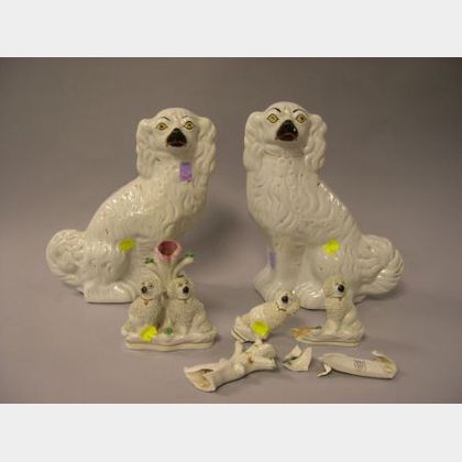 Pair of Staffordshire Spaniels and a Pair of Staffordshire Figural Dog Groups.