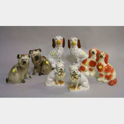 Two Pairs of Ceramic Pugs and Two Pairs of Staffordshire Spaniels. 
