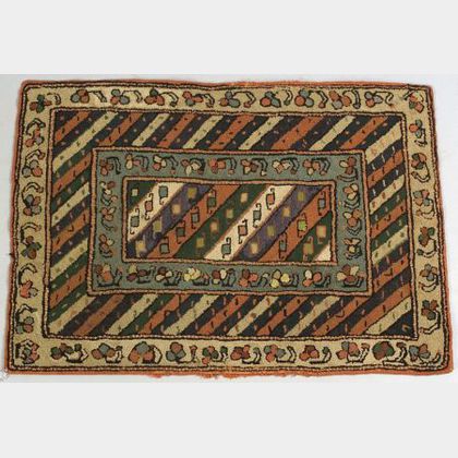 Small Hooked Oriental Pattern Rug. 