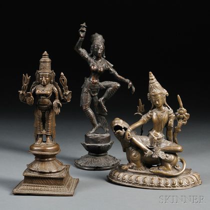 Three Metal Figures