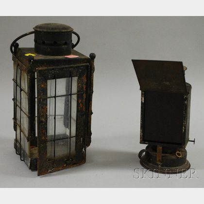 Black-painted Tin Kerosene Lantern with Red Glass Panel and a Black-painted Iron and Glass Candle Lantern. 