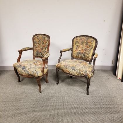 Two Louis XV Needlepoint-upholstered and Carved Walnut Fauteuils