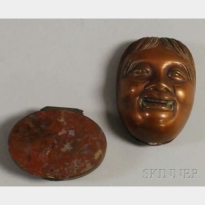 Japanese Copper Mask-form Match Safe and a Gilt-metal and Agate Snuff Box. Estimate $150-250