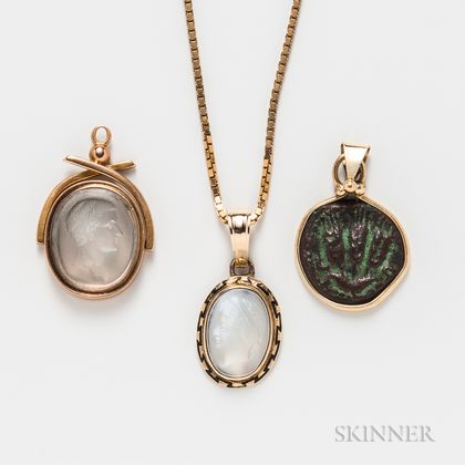 18kt Gold and Carved Moonstone Pendant and Chain, Carved Moonstone Intaglio Pendant, and an Ancient Coin Pendant