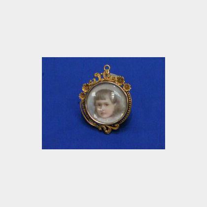 Gilt Mounted Miniature Portrait on Ivory of a Child. 