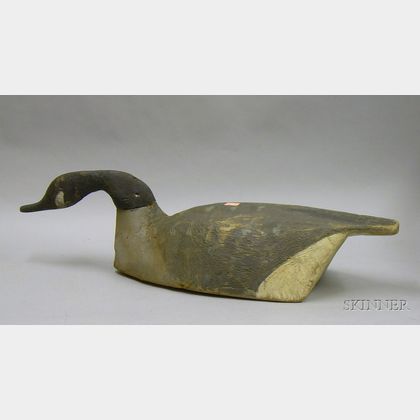 Carved and Painted Wooden Canada Goose Decoy. 