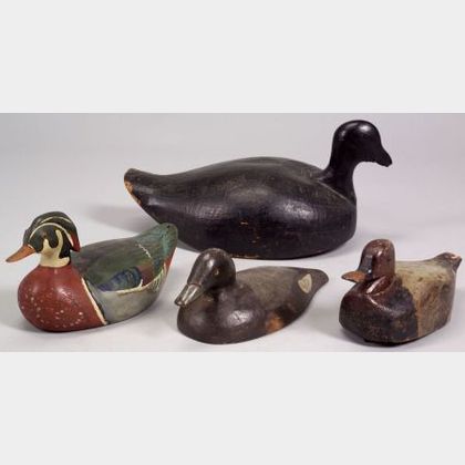 Four Carved and Painted Wooden Duck Decoys