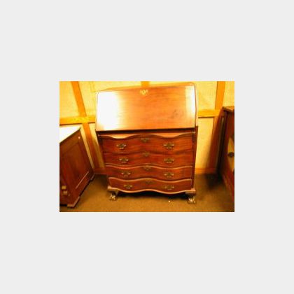 Governor Winthrop-style Carved Mahogany Serpentine Slant-lid Desk. 