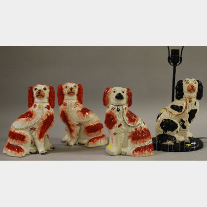 Four Staffordshire Seated King Charles Spaniels Figures
