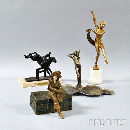 Four Metal Figures