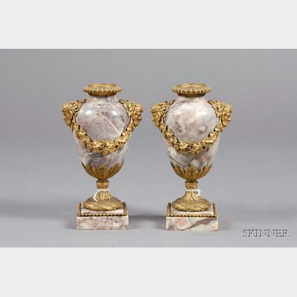 Pair of Louis XVI Ormolu-mounted Marble Candlesticks