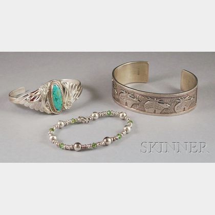 Three Silver Bracelets