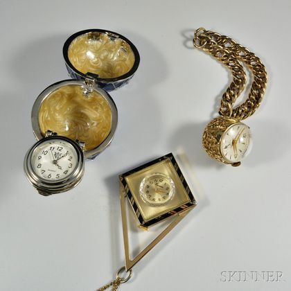 Welsboro Watch Bracelet, Geometric Endura Enameled Pendant, and a Watch in a Fabergé-style Enameled Egg. Estimate $80-100