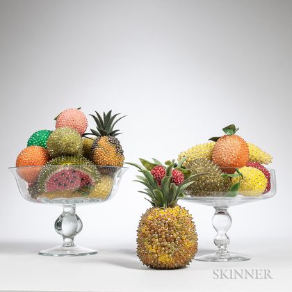 Two Colorless Glass Compotes with Various Beaded Fruit.