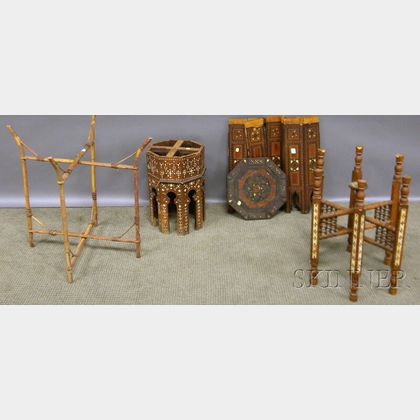 Two Brass and Damascene-decorated Tray Tables, Two Inlaid Tabourets, and a Persian Tile-top Painted Iron Stand. 