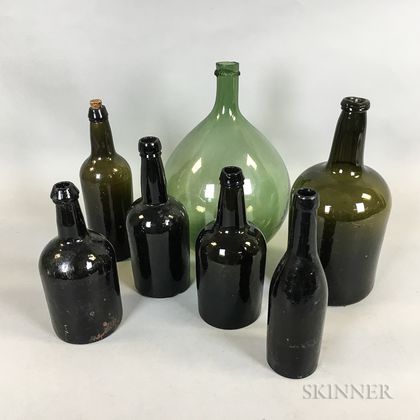 Seven Olive Blown Glass Bottles
