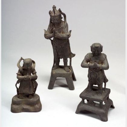 Three Bronze Figures