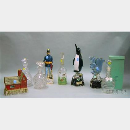 Eight Assorted Glass and Ceramic Liquor Decanters