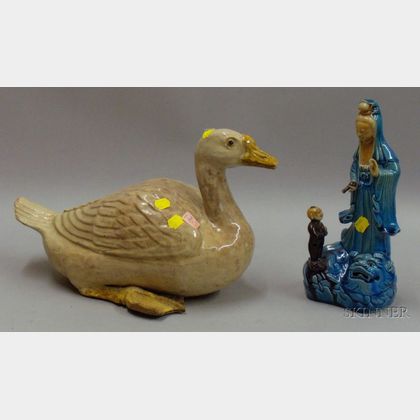 Chinese Export Pottery Figure of a Duck and a Chinese Export Porcelain Figural Group of Kuan Yin and a Child. Estimate $175-225