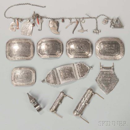 Group of Near Eastern Silver Amulets, Amulet Cases, and a Marriage Ring