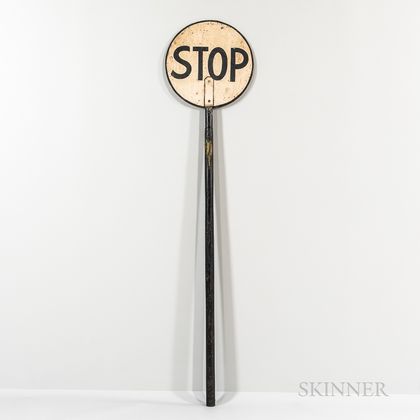 White- and Black-painted Stop Sign