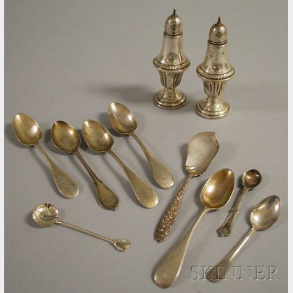 Eight Silver Flatware Items and a Pair of Weighted Silver Casters. 
