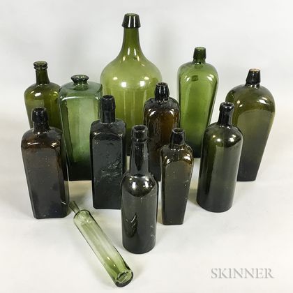 Twelve Olive and Amber Blown Glass Bottles and Cased Gins