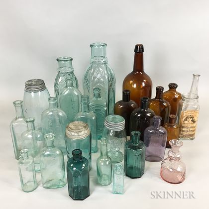 Twenty-six Colored Blown Glass Patent Medicine Bottles, Jars, and Flasks