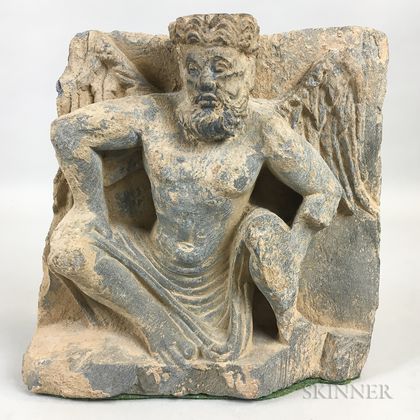 Stone Carving of Winged Atlas