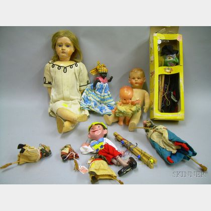 Four Assorted Celluloid Dolls