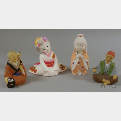 Four Japanese Painted Ceramic Dolls. 