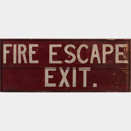 Red- and White-painted "Fire Escape/Exit" Sign