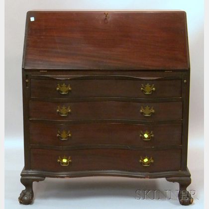 Chippendale-style Carved Mahogany Slant-lid Serpentine Desk. 
