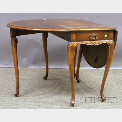 English Queen Anne-style Carved Walnut and Burlwood Veneer Drop-leaf Table. 