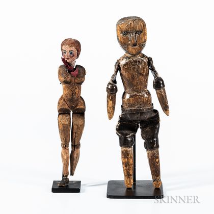 Two Carved Articulated Wood Figures