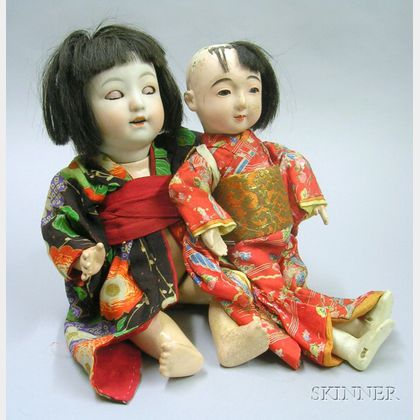 Two Japanese Character Dolls