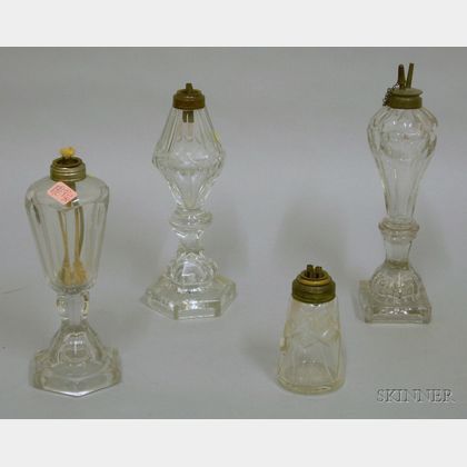 Three Colorless Cut Glass Fluid Lamps and a Pressed Glass Lamp
