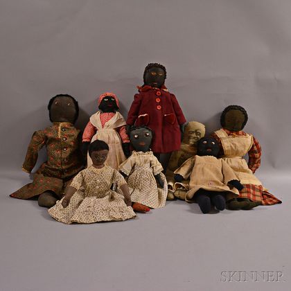 Eight Black Rag Dolls