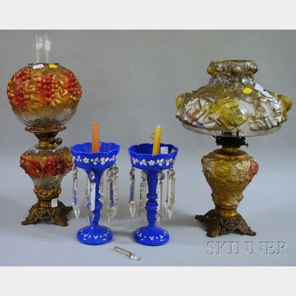 Two Painted Molded Glass Kerosene Table Lamps with Shades and a Pair of Enamel-decorated Blue Glass Lustres with Prisms