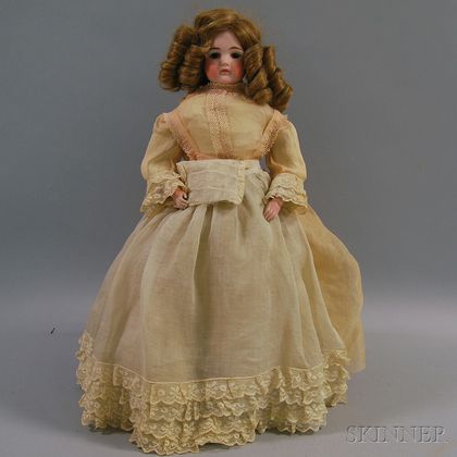 Closed-mouth German Bisque Shoulder Head Doll