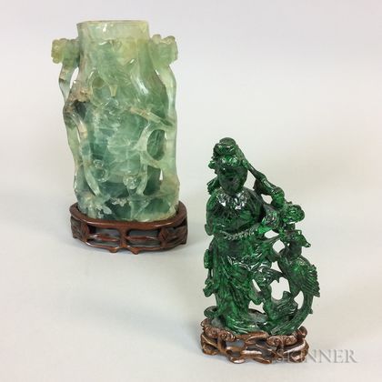 Two Green Carved Stone Figures on Wooden Stands