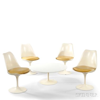 Four Saarinen Swivel Chairs and a Coffee Table 